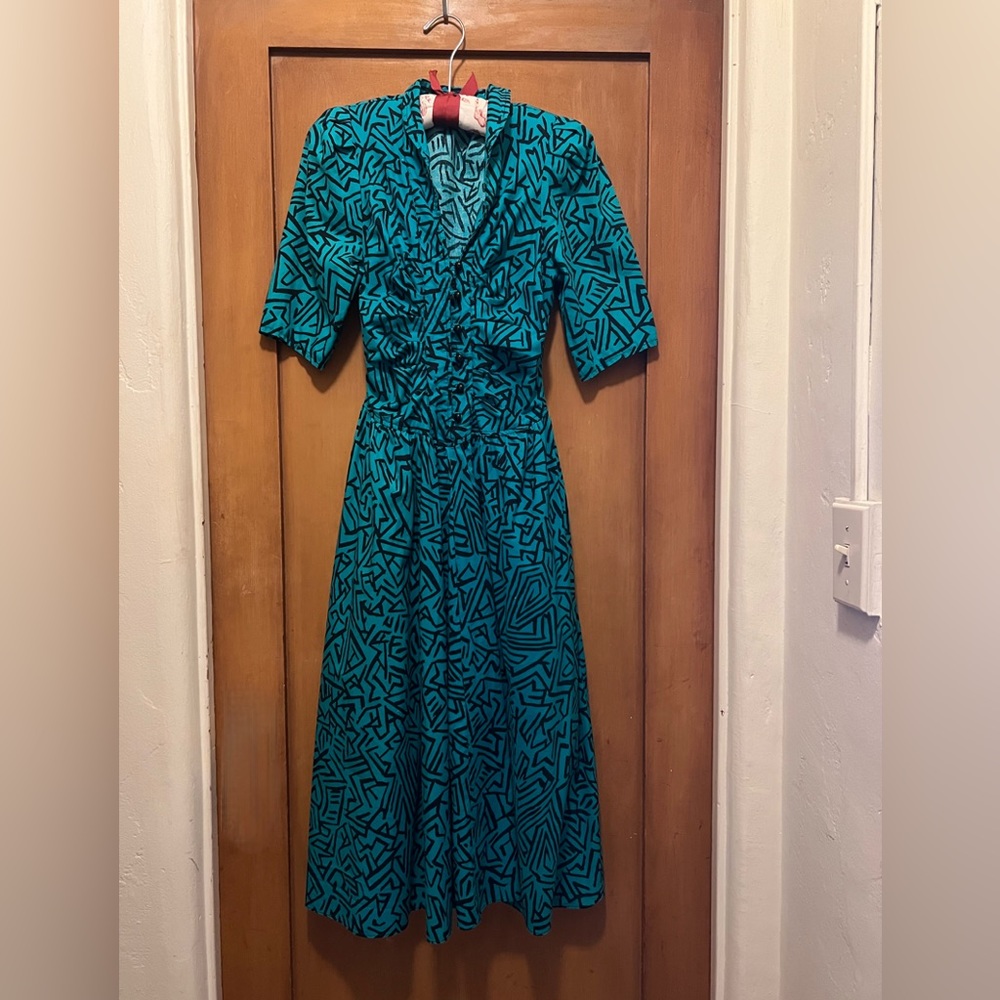 Fun turquoise 80s print shift-waist dress